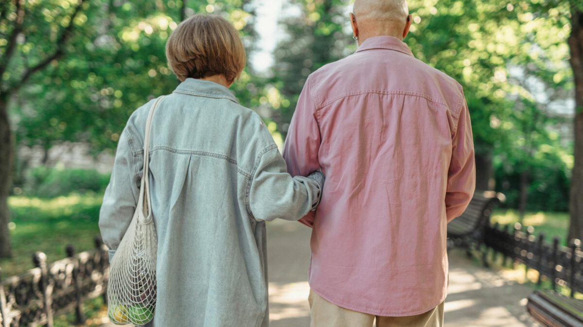 Active couple in their fifties exploring Edmonton neighbourhoods while considering downsizing