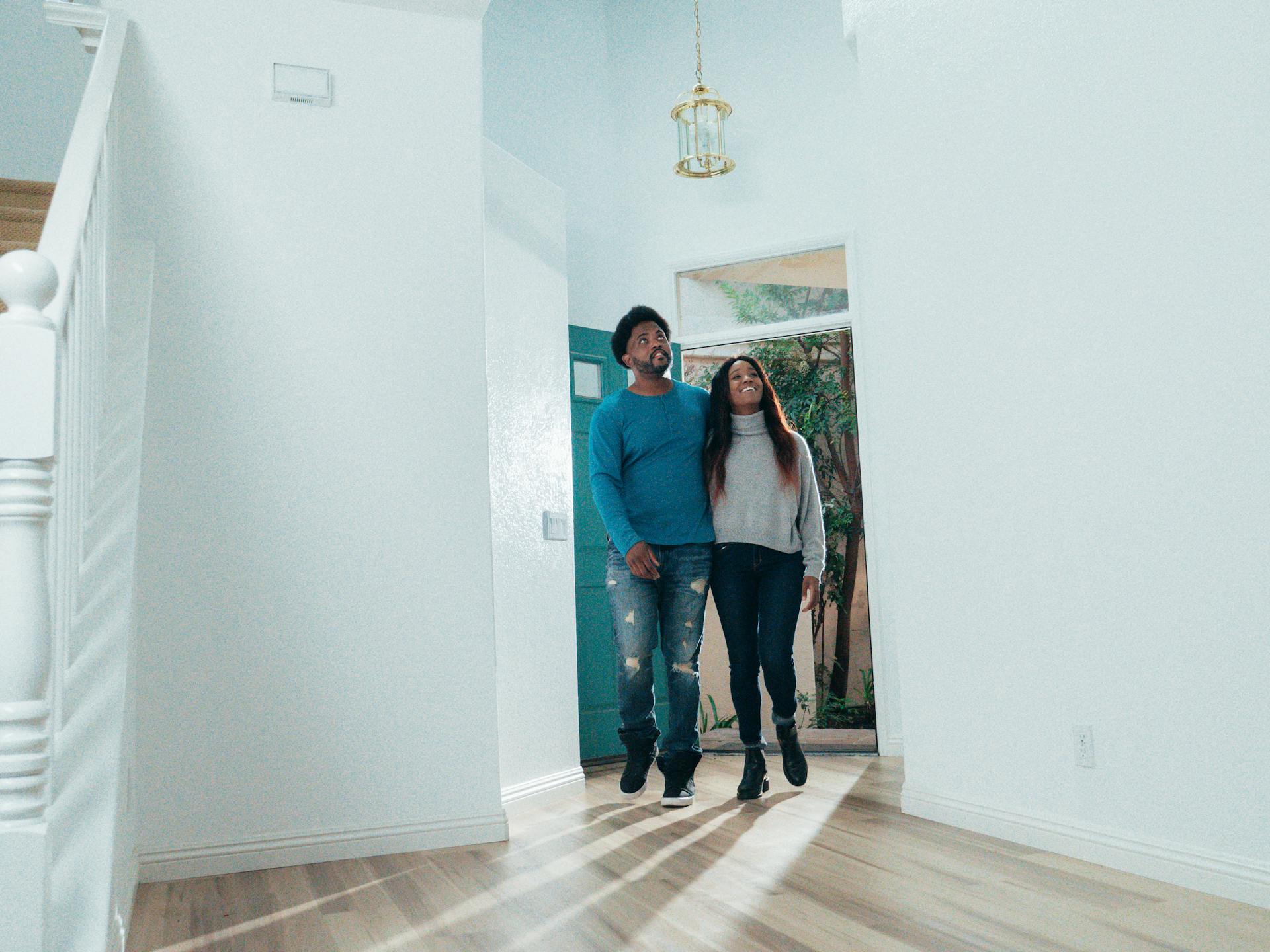 Edmonton home buyers viewing property during a showing with their real estate agent