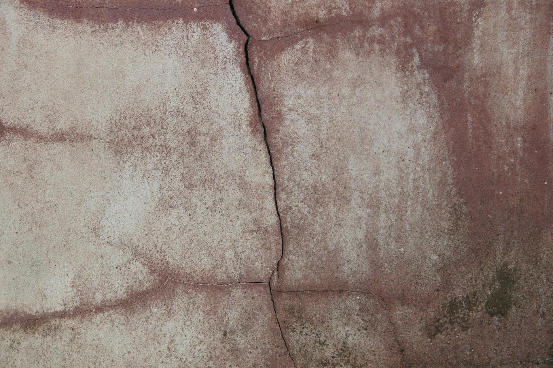 Foundation crack in basement wall that could indicate structural issues in older Edmonton homes