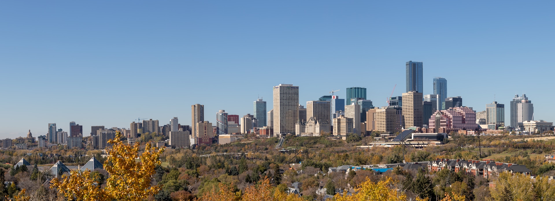 Downtown Edmonton skyline above the river valley on an autumn afternoon